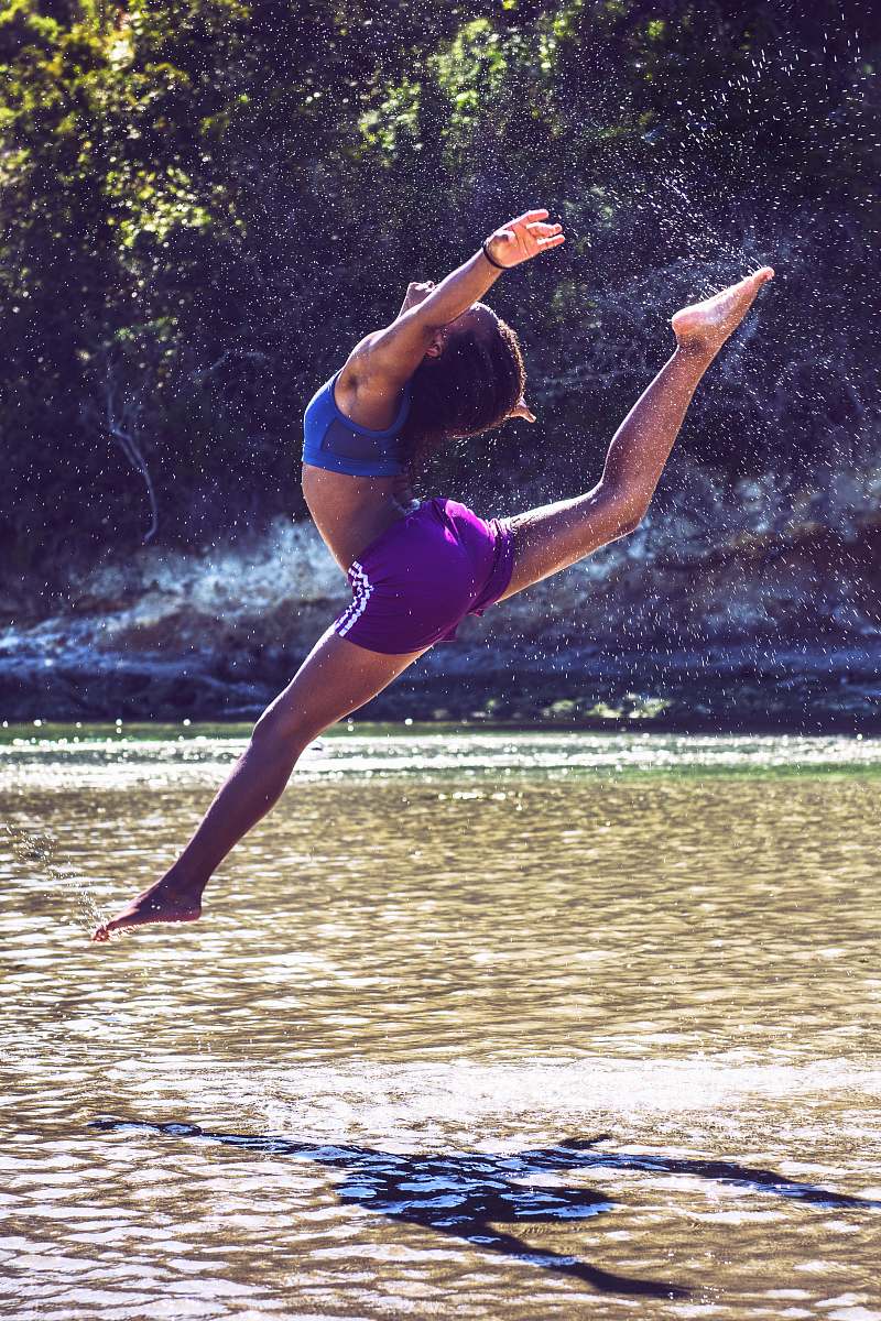 dance pose woman bending on body of water leisure activities
